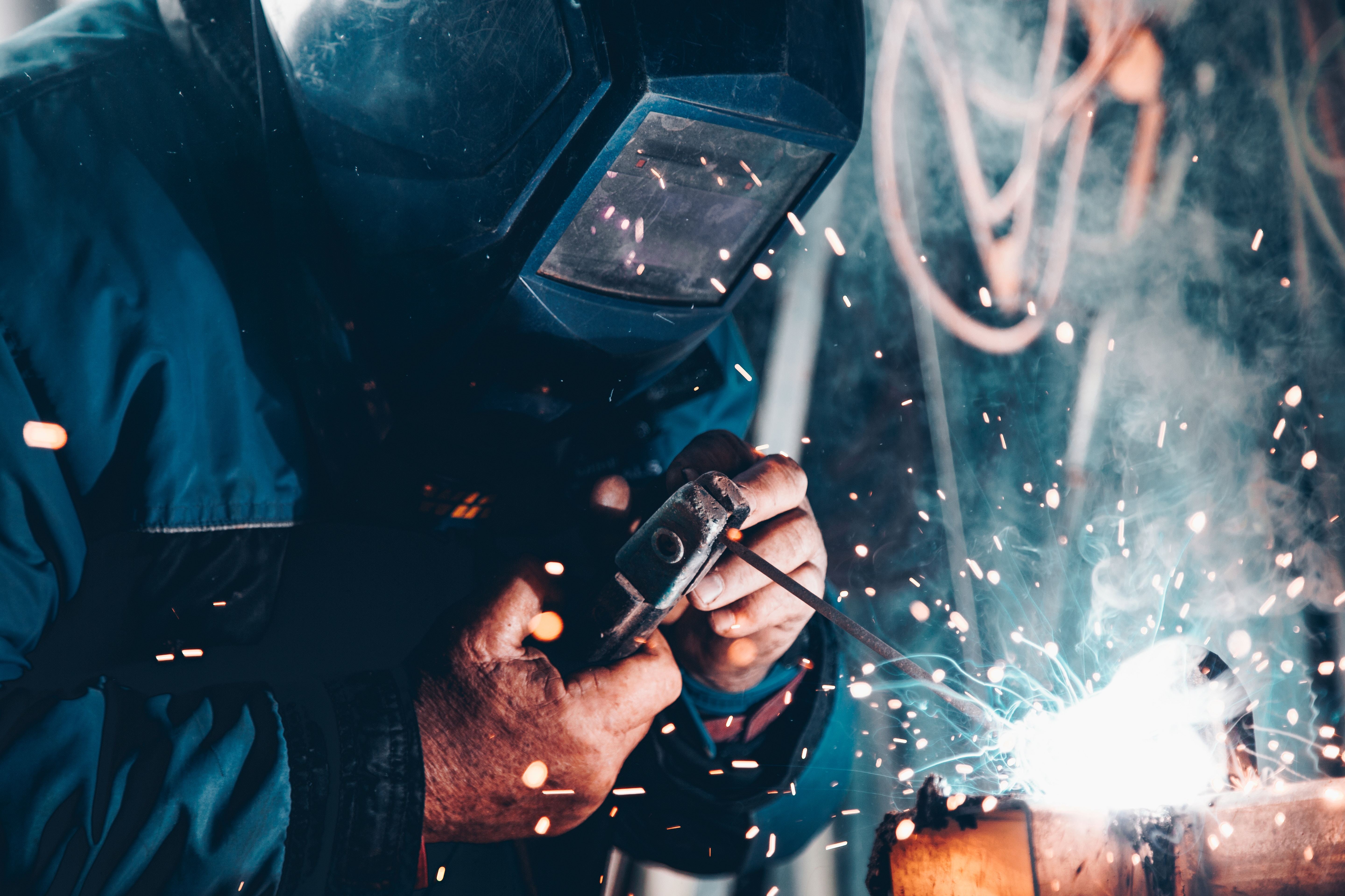 Man welding offsite modular construction